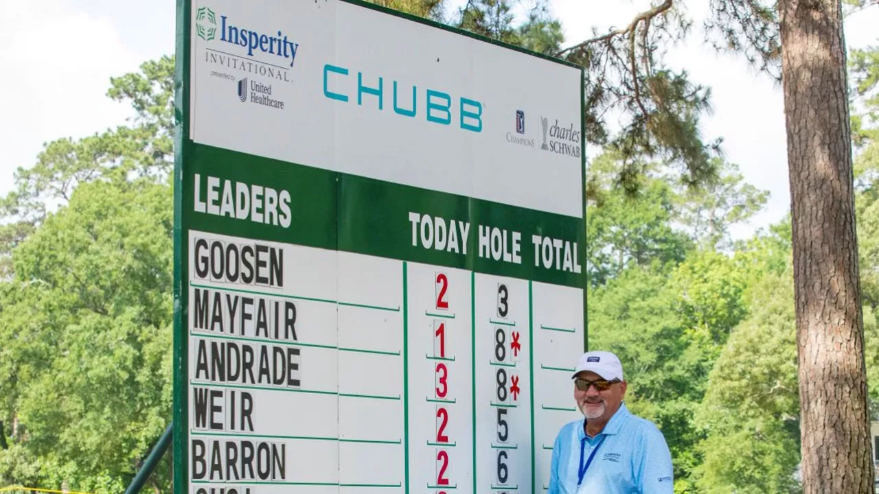 Volunteer at scoreboard